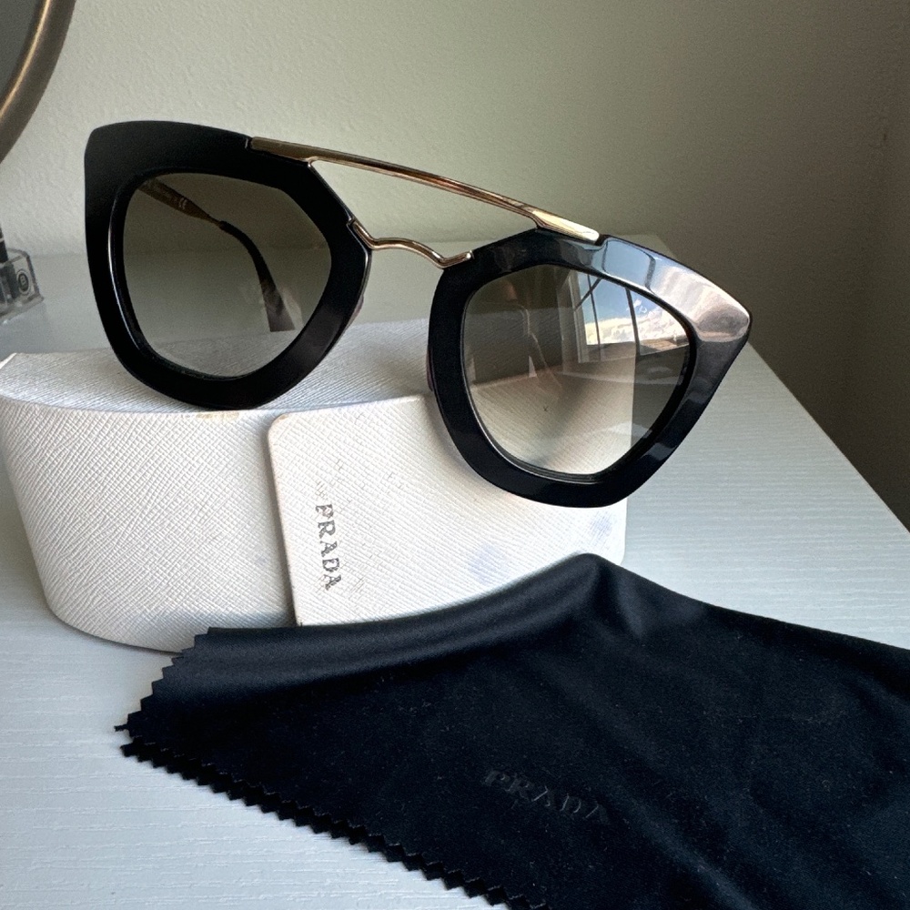 Prada Women’s Sunglasses.